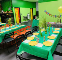 Green tables in a green room.